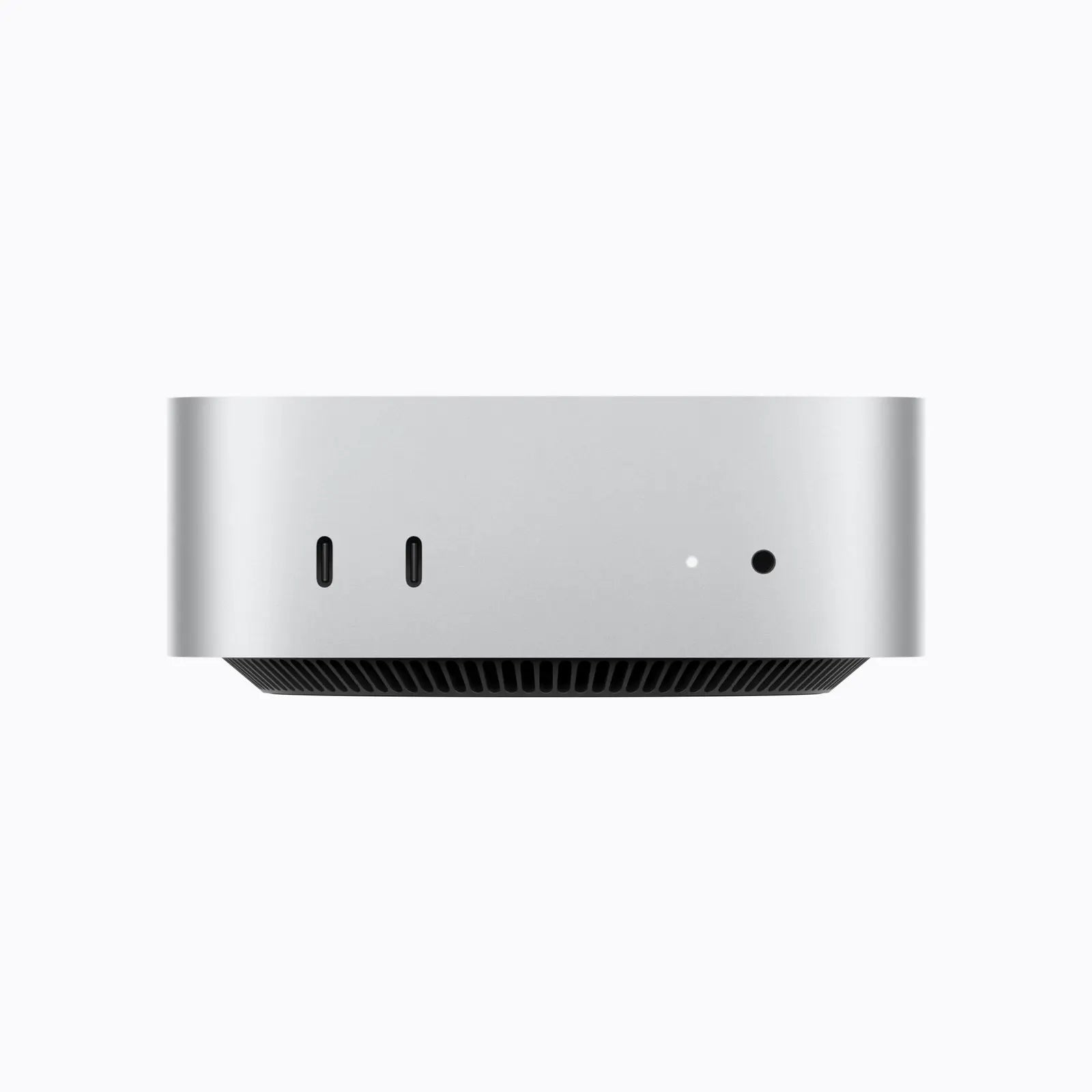 Front of Apple Mac mini M6 with two USB-C ports and a headphone jack