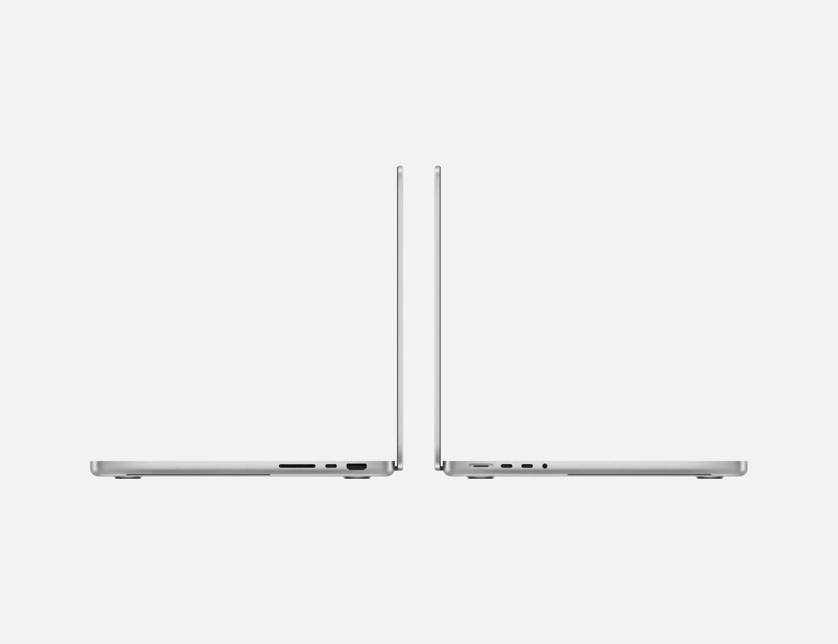 Apple MacBook Pro 14-inch M4 in Silver, side profile, open
