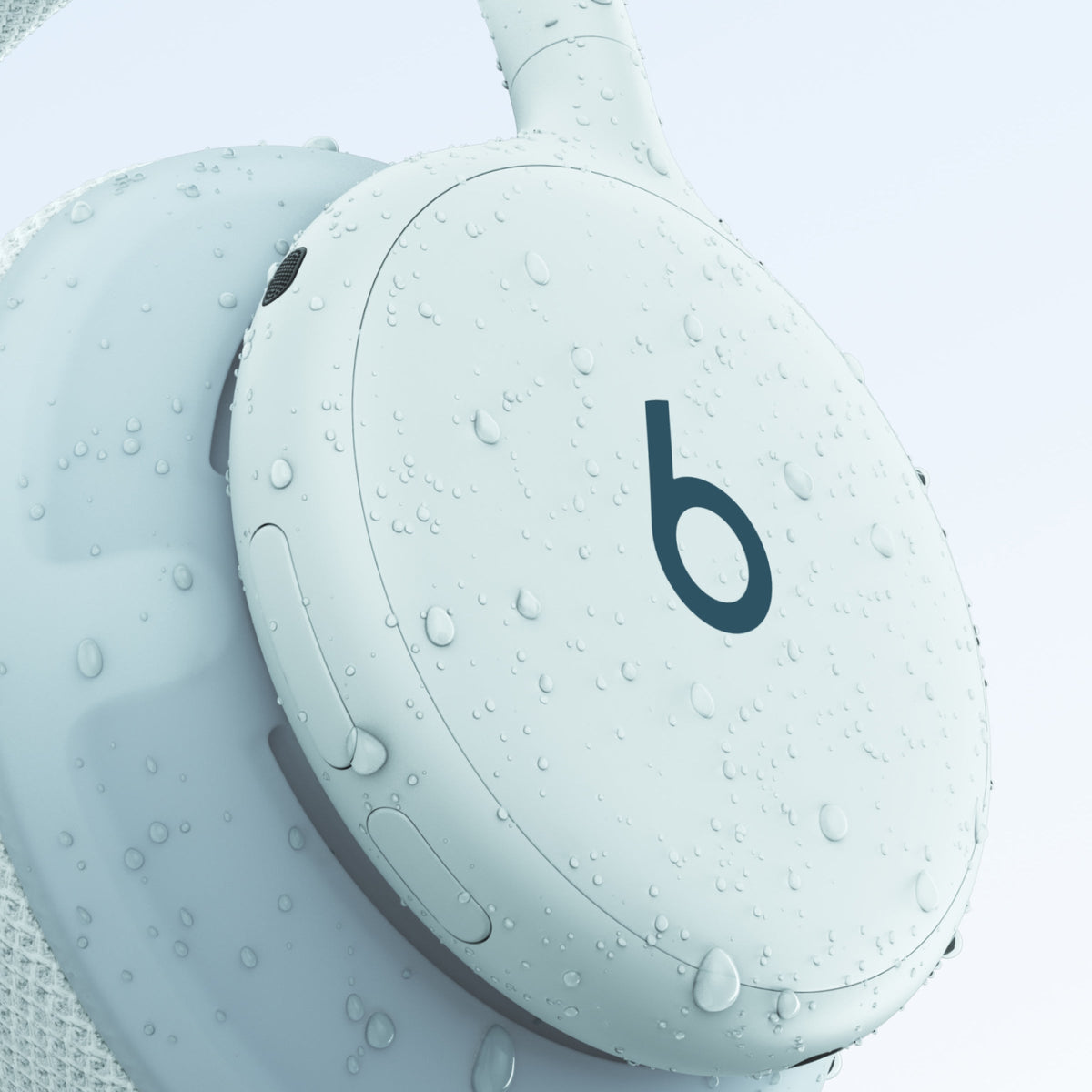 Beats 360 in Sky with water droplets on the earcup