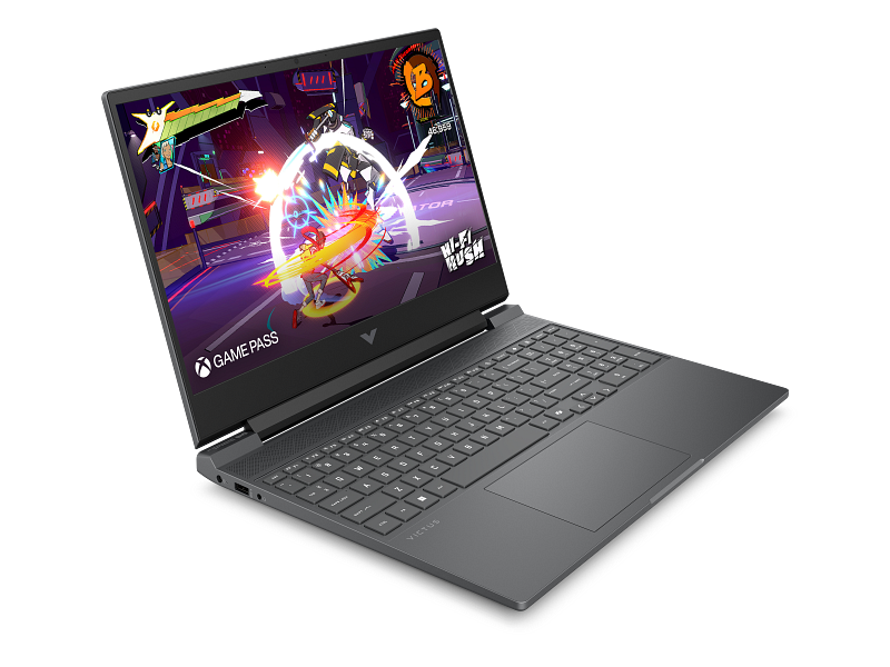 HP Victus 15-fa2352TX in Mica Silver, open at an angle from the front left with a game on the screen