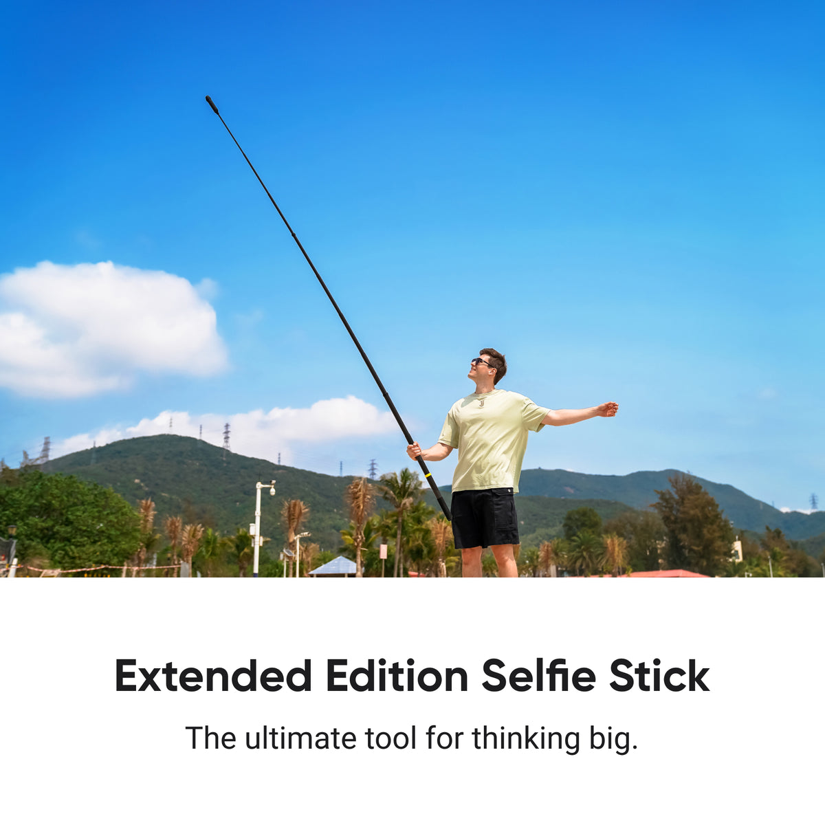 Insta360 Enhanced Extended Edition Selfie Stick extended for a high third-person shot