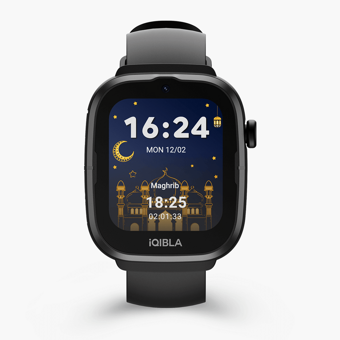 Front of the Black iQibla Qwatch A2 showing the time and the Maghrib prayer time