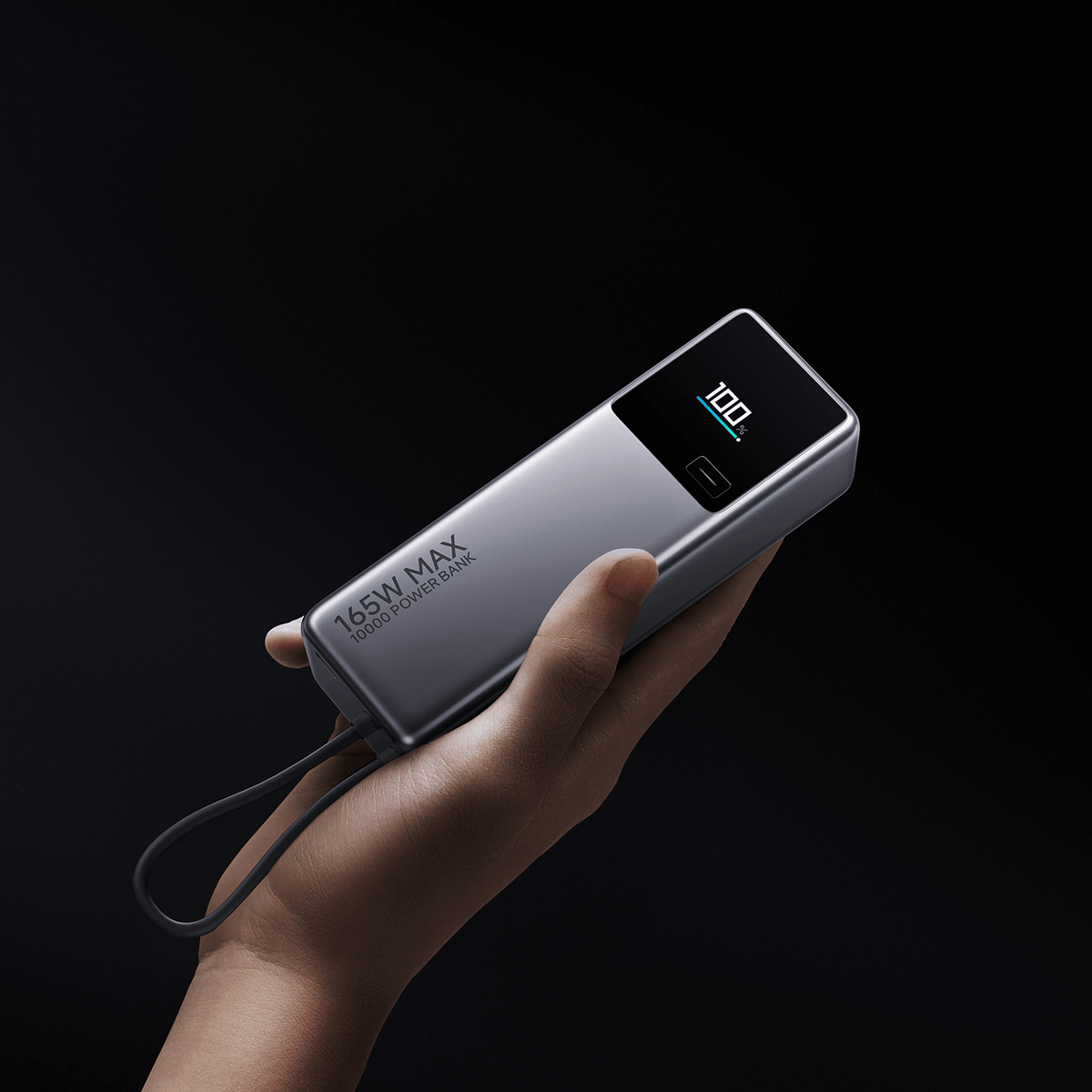 Xiaomi 165W Power Bank 10000 held in one hand