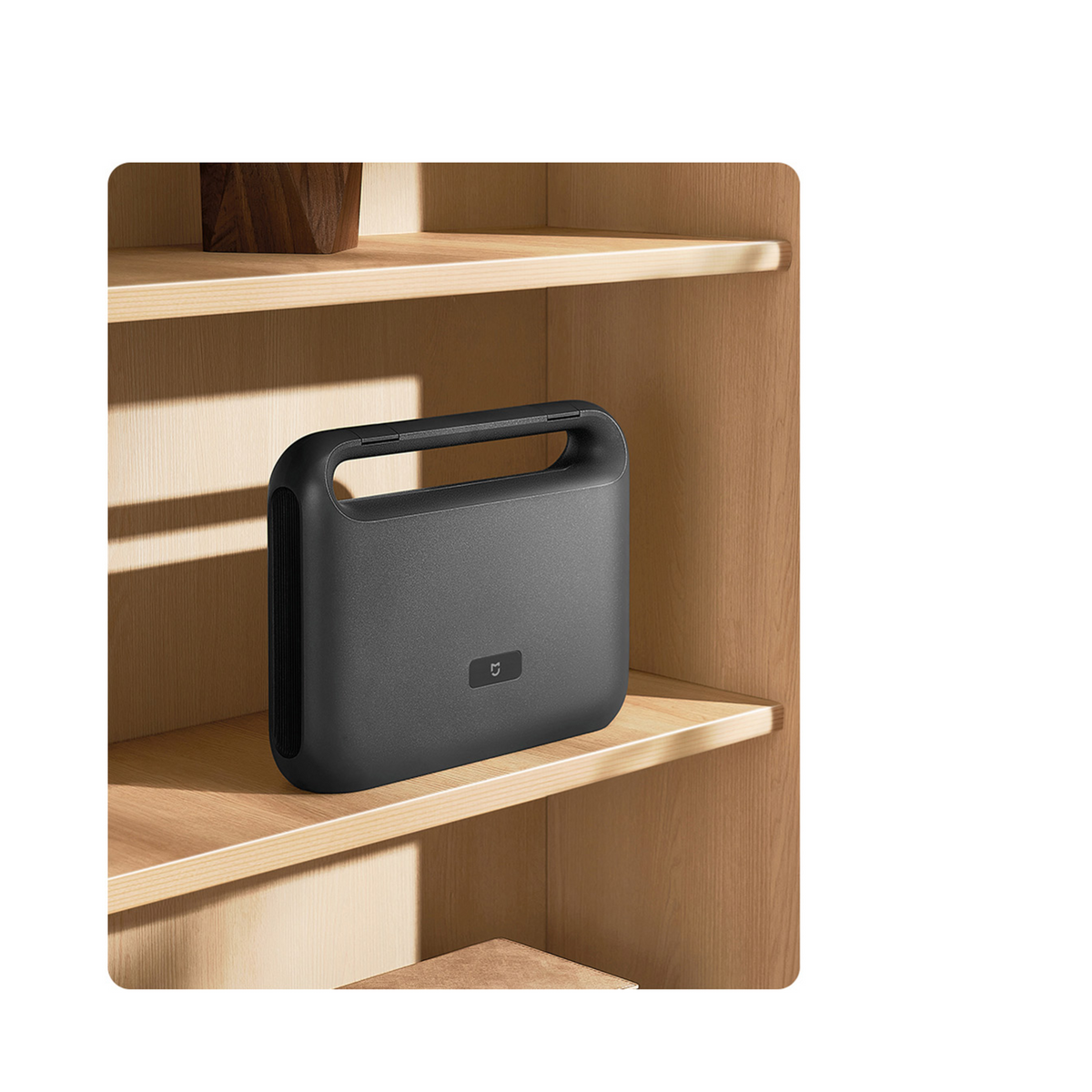 Xiaomi Mijia Tool Kit closed case with its carry handle stored on a wooden shelf
