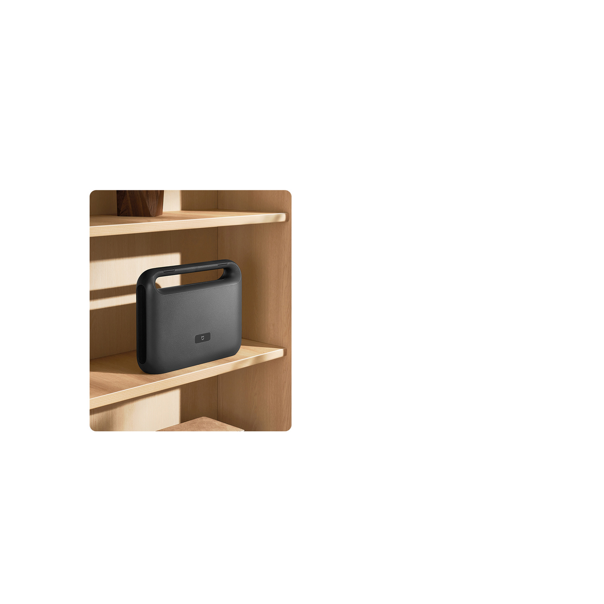 Xiaomi Mijia Tool Kit closed case with its carry handle stored on a wooden shelf