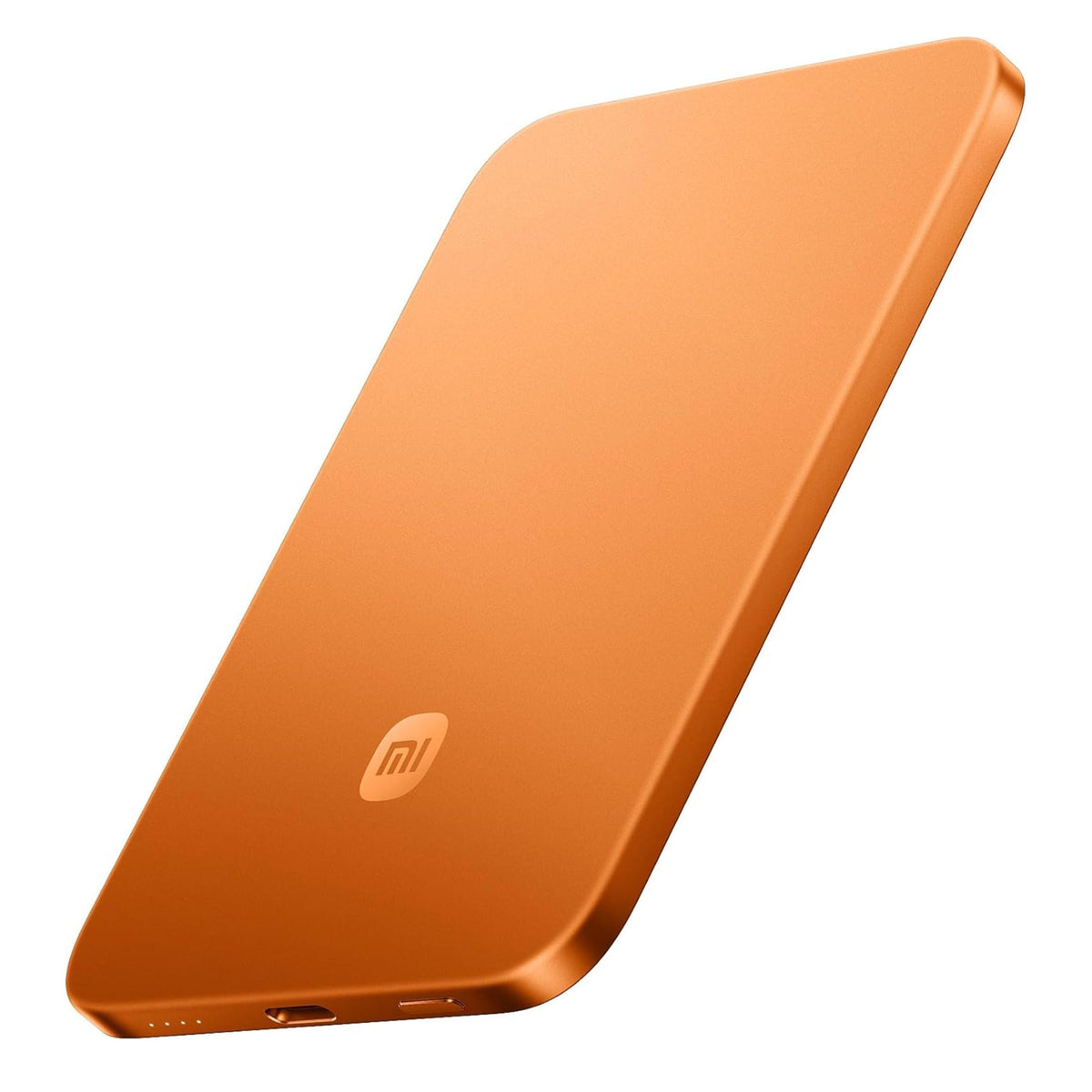 باور بانك شاومي مغناطيسي UltraThin سعة 5000 مللي أمبير باللون Radiant Orange بزاوية جانبية تُظهر منفذ USB-C