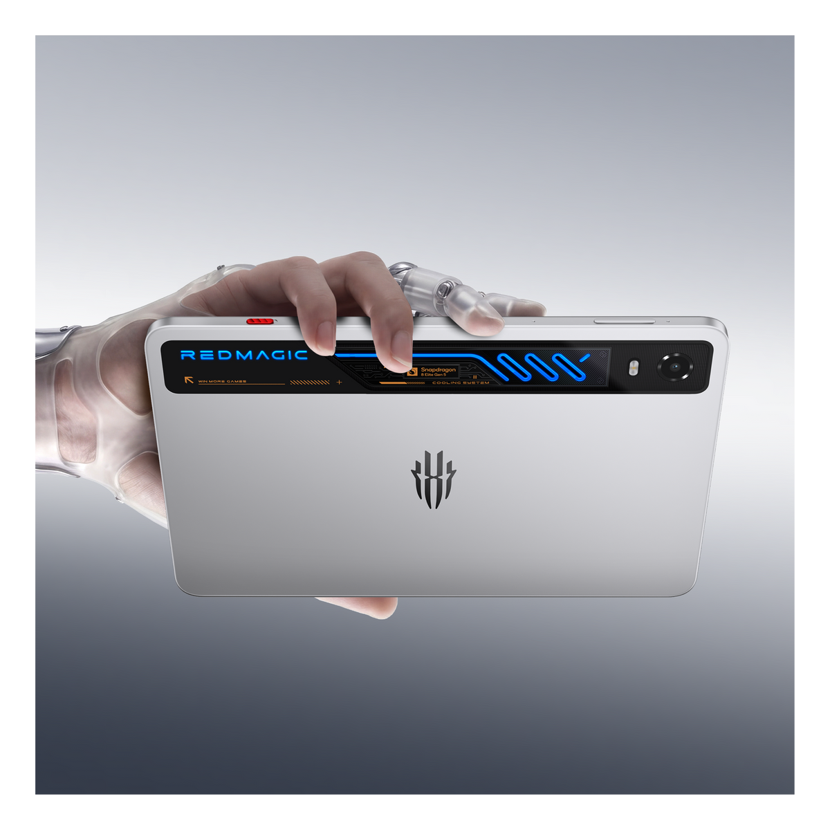 ZTE RedMagic Astra 2 in Starfrost Silver held in landscape, showing the lit cooling window and the side USB-C port